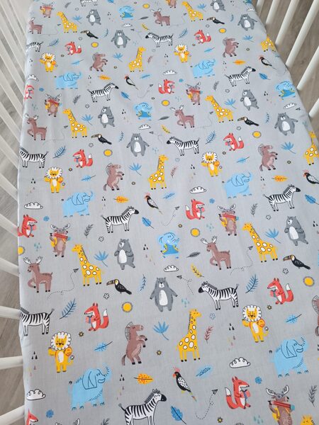 Gultas paladziņš - krāsaini dzīvnieciņi uz pelēka fona